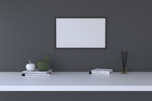 A closeup shot of a black frame with decorative items on the shelf
