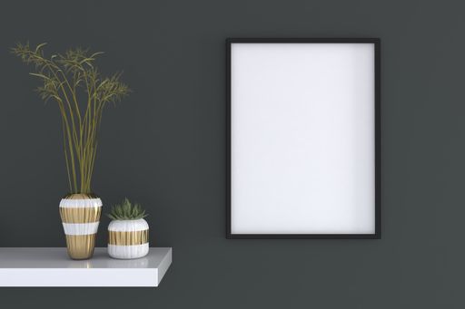 A closeup shot of a black frame with plants on the shelf