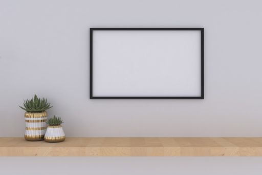 A closeup shot of a black frame with vases on the shelf