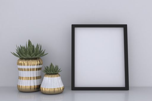A closeup shot of a black frame with vases on the shelf
