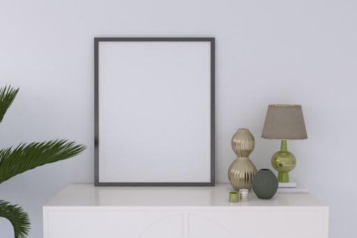 A closeup shot of a black frame with vases on the shelf