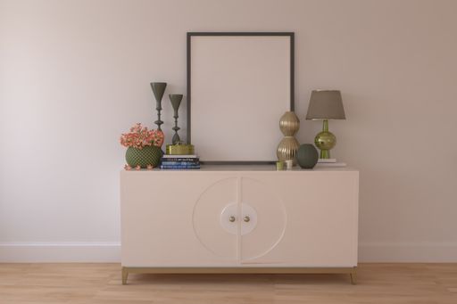 A drawer with a black frame and other decorative items
