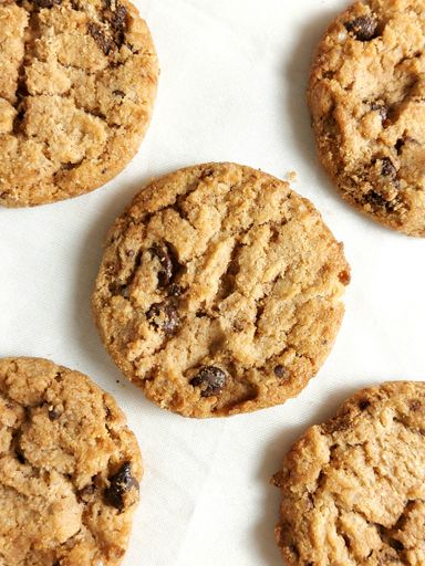 A top-view of delicious peanut butter cookies on a white surface