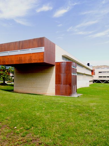 A natural view of modern architecture under a clear blue sky