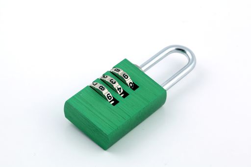 A closeup shot of a safety padlock isolated on a white background