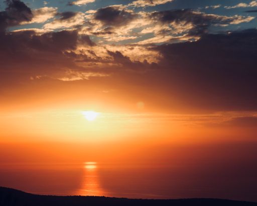 The calm waters of the Mediterranean sea during the golden sunset