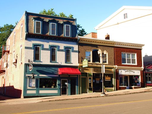  Small shops along Seneca Street in downtown Geneva, New York on a quiet summer morning