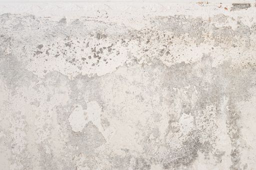Detail of damaged wall of a home interior. Full frame