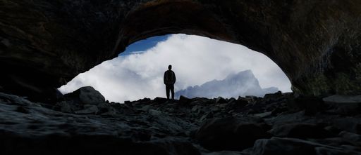 Adventurous Man Hiker standing in cave with dramatic cloud and snowy mountain view. Adventure Composite. 3d Rendering Peak. Dramatic night scene.
