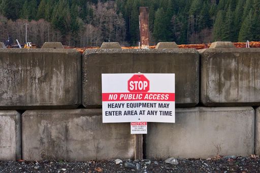 A sign warning public to stay out, Dangerous industrial yard