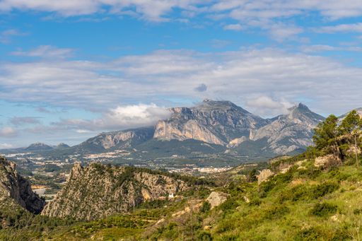 A beautiful shot of rocky mountains under the blue sky