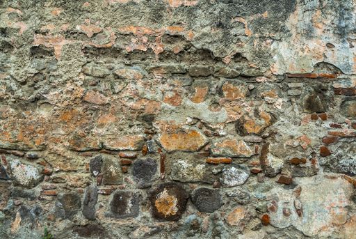 Textures generated in paintings on walls exposed to the elements in the colonial city of La Antigua Guatemala, detail accidental public abstract art.