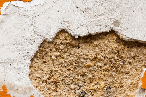 Textures generated in paintings on walls exposed to the elements in the colonial city of La Antigua Guatemala, detail accidental public abstract art.