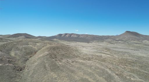 A scenic desert with hills against the background of a blue sky. Nevada, USA