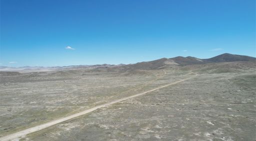 A scenic desert with hills against the background of a blue sky. Nevada, USA