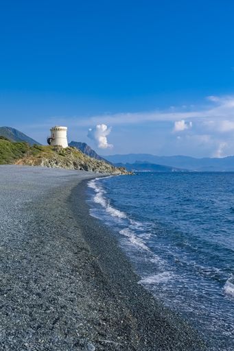 Corsica, aerial view of the Nonza beach, with black pebble, in the cap Corse