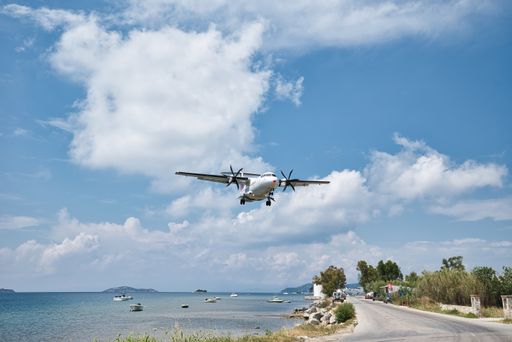 Airplane with passengers lands on the Skiathos Airport , Tourism 2021,  COVID-free, Skiathos island, Greece, June-9-2021