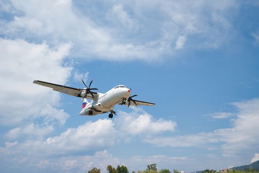 Airplane with passengers lands on the Skiathos Airport , Tourism 2021,  COVID-free, Skiathos island, Greece, June-9-2021