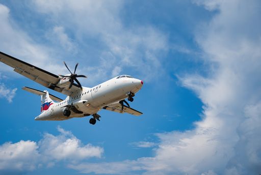 Airplane with passengers lands on the Skiathos Airport , Tourism 2021,  COVID-free, Skiathos island, Greece, June-9-2021