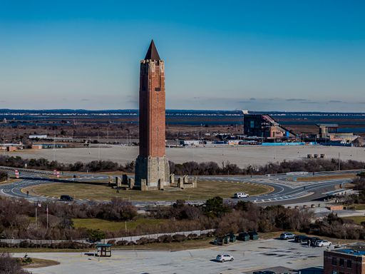 An aerial view of the Jones Beach water tower on a sunny day in winter on Long Island, New York. The beach is empty.