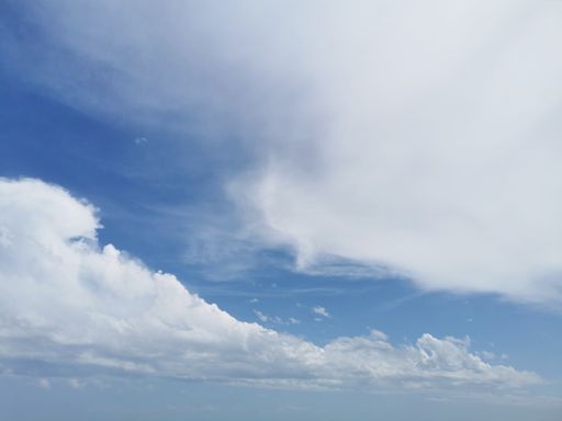 A low angle shot of white clouds in Malaga, Spain