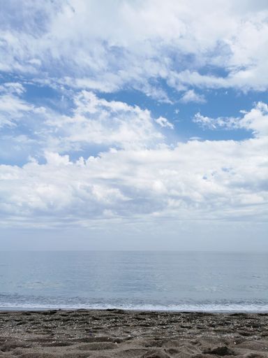 A low angle shot of white clouds in Malaga, Spain