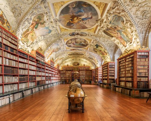 A beautiful antique library with numerous books on the shelves in Prague, the Czech Republic