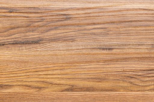 Brown oak wood board background. Textured wood plank backdrop.