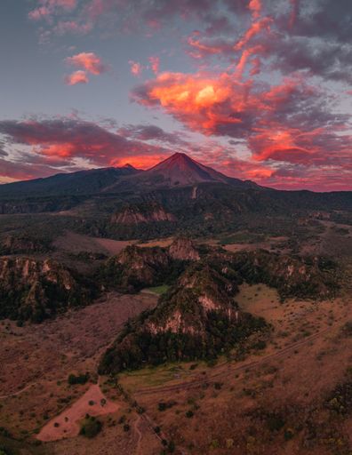 A sunset view of the majestic Colima Volcano, located in Mexico