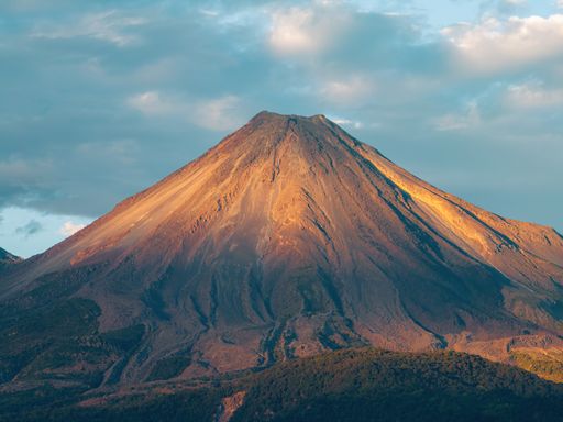 A scenic view of Colima's Volcano in Mexico at sunset