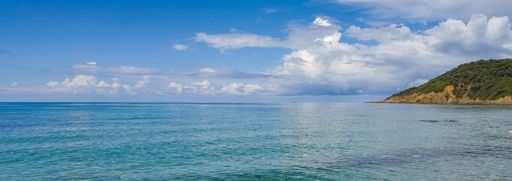 Corsive, France, transparent turquoise water on a beautiful beach in summer