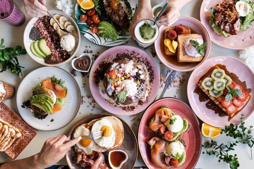 Brunch Choice Crowd Food Concept. Family breakfast or brunch served on a table. Aerial view