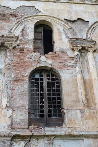 A vertical shot of an old abandoned building ruins