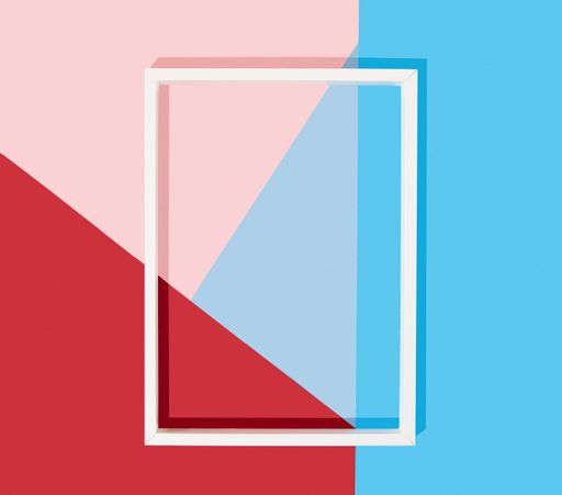 A vertical shot of an empty white frame on a multicolored background
