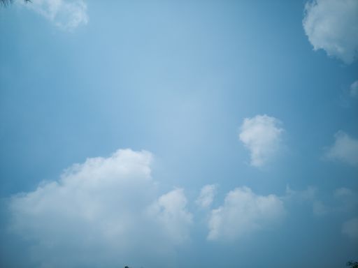 A low angle shot of blue cloudy sky - great for wallpaper