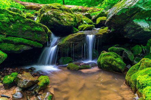 A small waterfall with mossy rocks in Shenandoah National Park. Virginia, USA