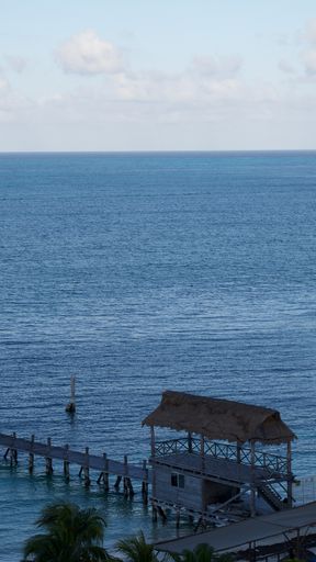 A wooden pier extending into the sea