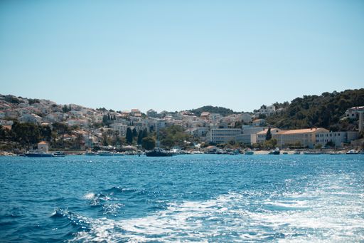 A beautiful view of the coastal Dalmatia region in Croatia under a clear blue sky
