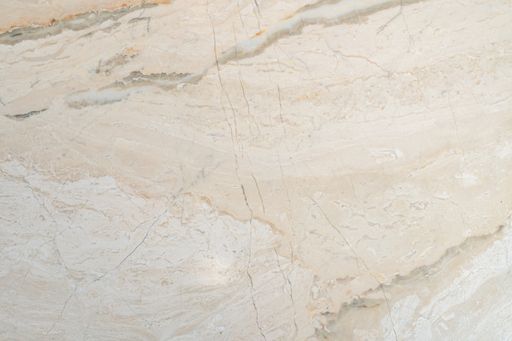 Textured, warm toned, natural marble stone surface