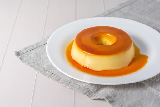 A Close-up of brazilian pudding, traditional dessert over table