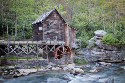 The famous Glade Creek Grist Mill with trees in the background, in Babcock State Park, Landisburg, WV, USA