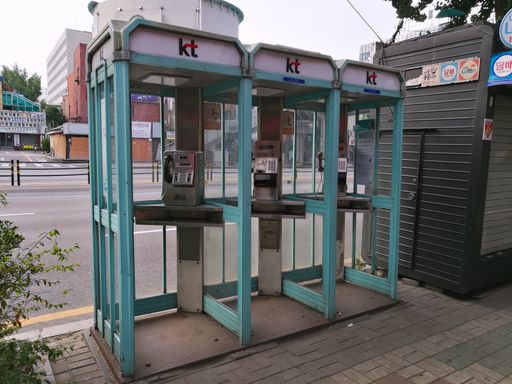 Three phone boxes of Korea Telecom side by side. Seoul, South Korea, 28th June 2019.