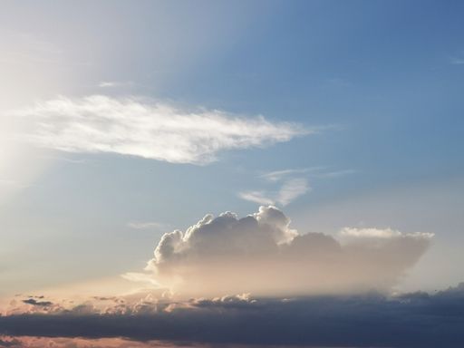 A beautiful view of dense fluffy clouds in the blue sky - perfect for wallpapers