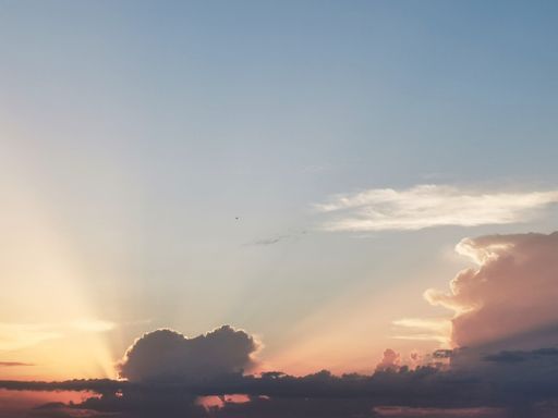 A beautiful view of dense fluffy clouds in the blue sky - perfect for wallpapers