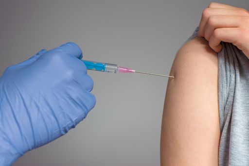 Vaccination concept, doctor is preparing to vaccinate the patient