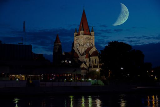 A magical view of the St. Francis of Assisi Church at night in Vienna