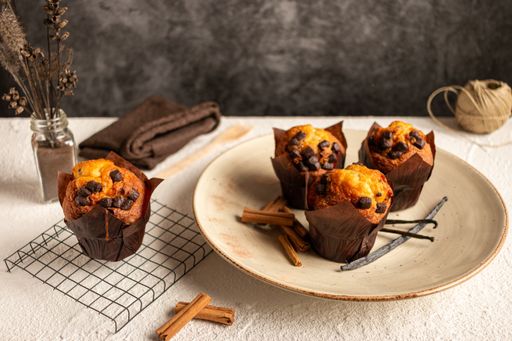 A closeup shot of delicious muffins with chocolate chips and cinnamon