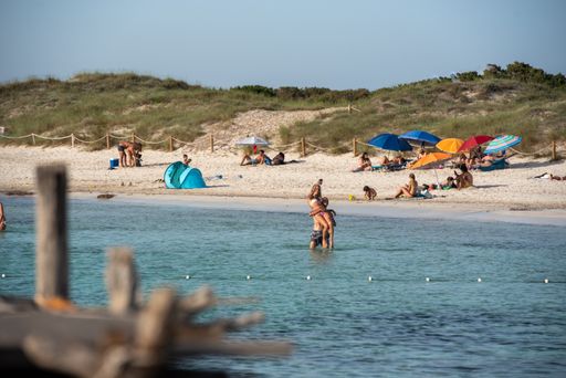 Formentera, Spain: 2021 June 13: Tourists enjoying the Illetes Beach in Formentera in Spain in times of Covid19