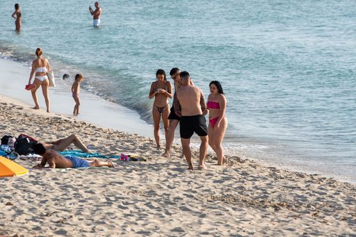 Formentera, Spain: 2021 June 13: Tourists enjoying the Illetes Beach in Formentera in Spain in times of Covid19