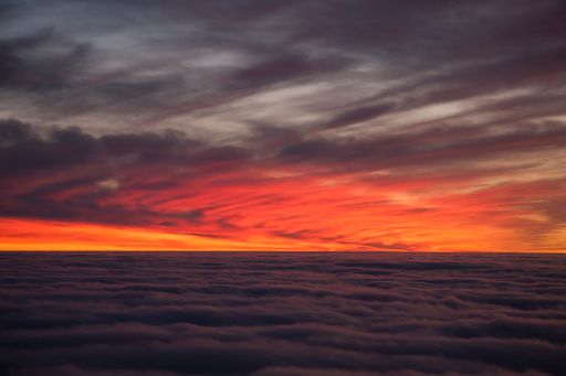 Spectacular sunset over a sea of clouds. Beautiful landscape